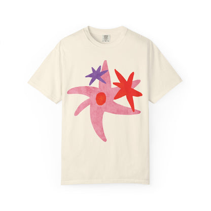 Beige t-shirt with colorful abstract design on a white background