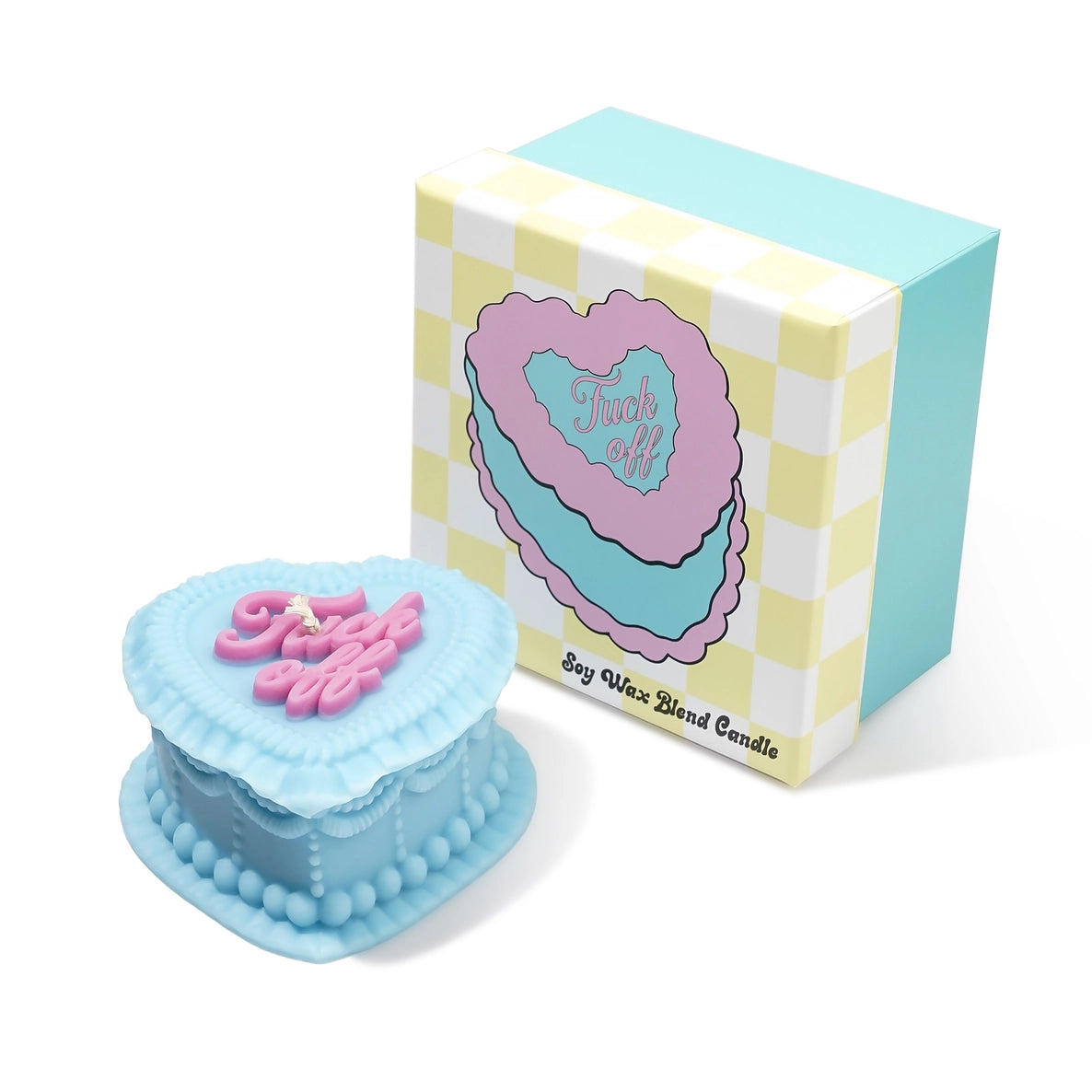 Blue heart-shaped candle with pink "fuck off" text and checkered box packaging on a white background