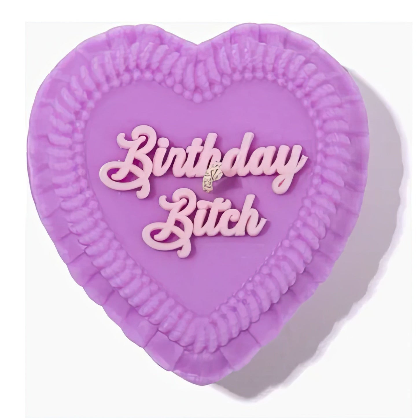 Purple heart-shaped gift candle with 'Birthday Bitch' text on a white background