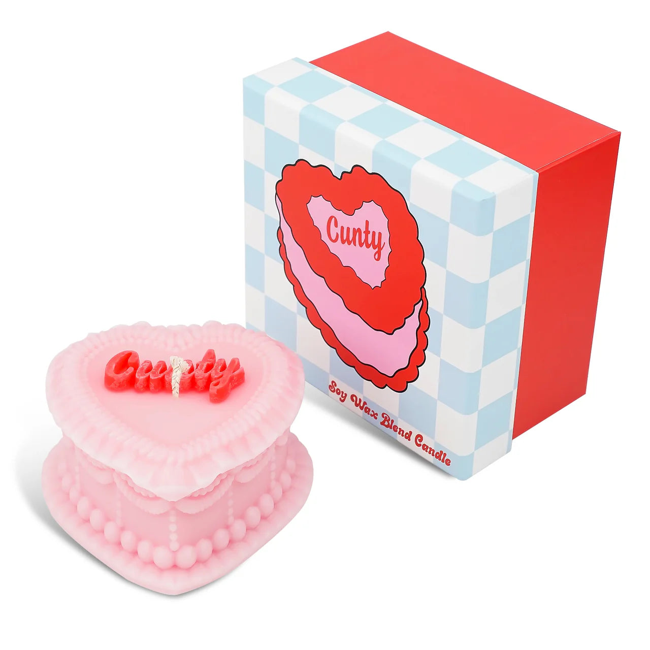 Pink heart-shaped candle with 'Cuntty' text next to its box on a white background